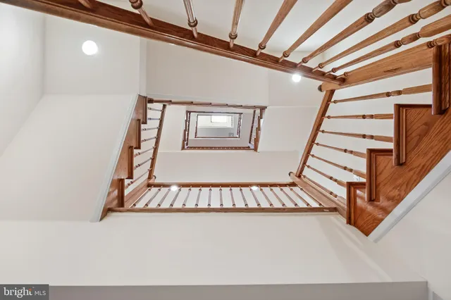a view of staircase with large window
