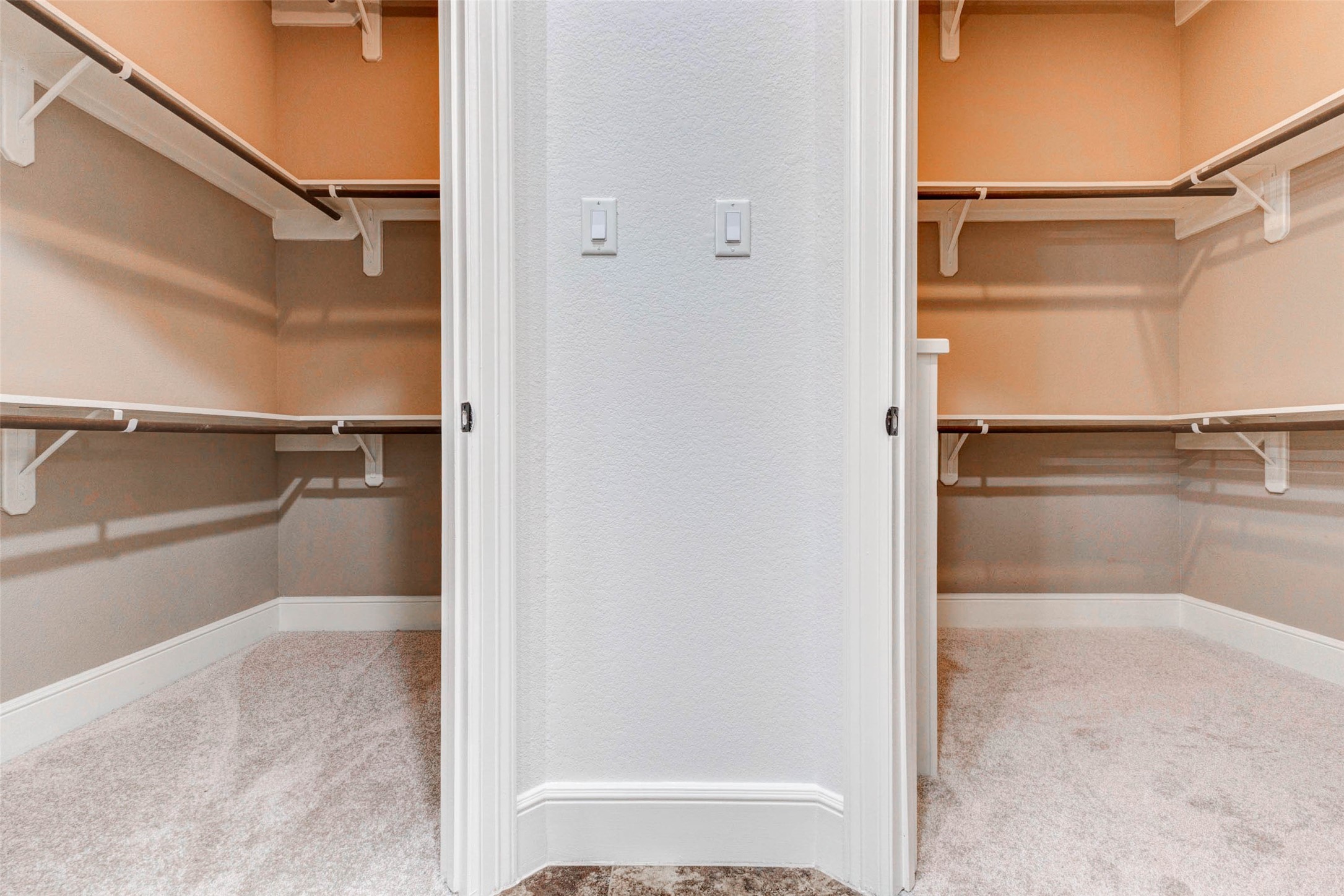5327 Whitmore Fulshear, TX 77441 - Photo 27 of 50 Dual walk-in closets provide exceptional organization and storage space, ensuring plenty of room for every wardrobe.