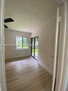 241 Wimbledon Lakes Drive, Unit 241 Plantation, FL 33324 - Photo 14 of 16 a view of an empty room with a window