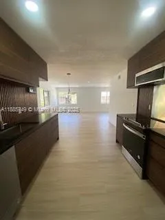 a view of kitchen with stove