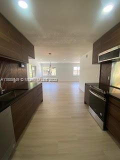 241 Wimbledon Lakes Drive, Unit 241 Plantation, FL 33324 - Photo 7 of 16 a view of kitchen with stove