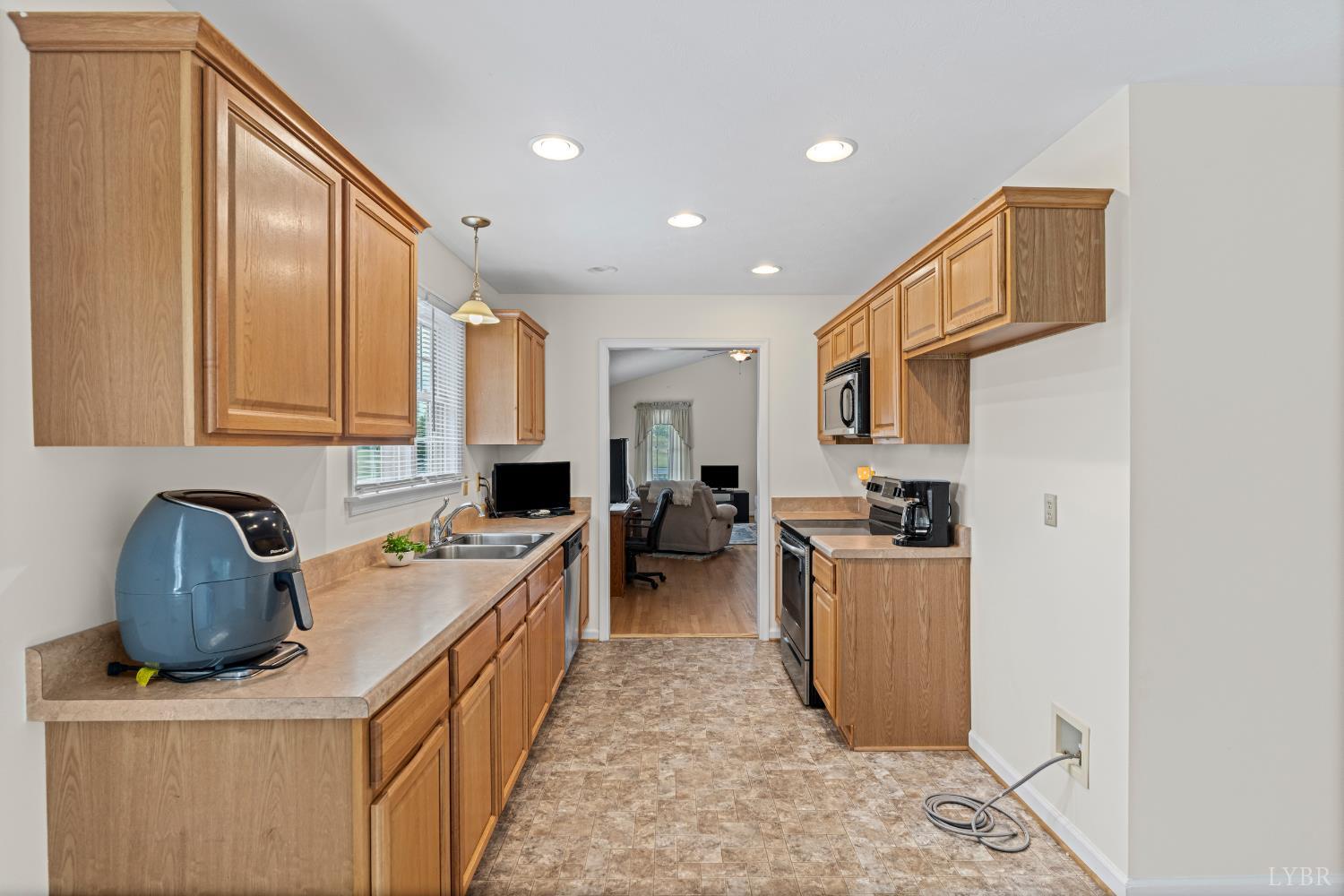233 View Lane Concord, VA 24538 - Photo 19 of 45 a kitchen with a sink a stove and cabinets