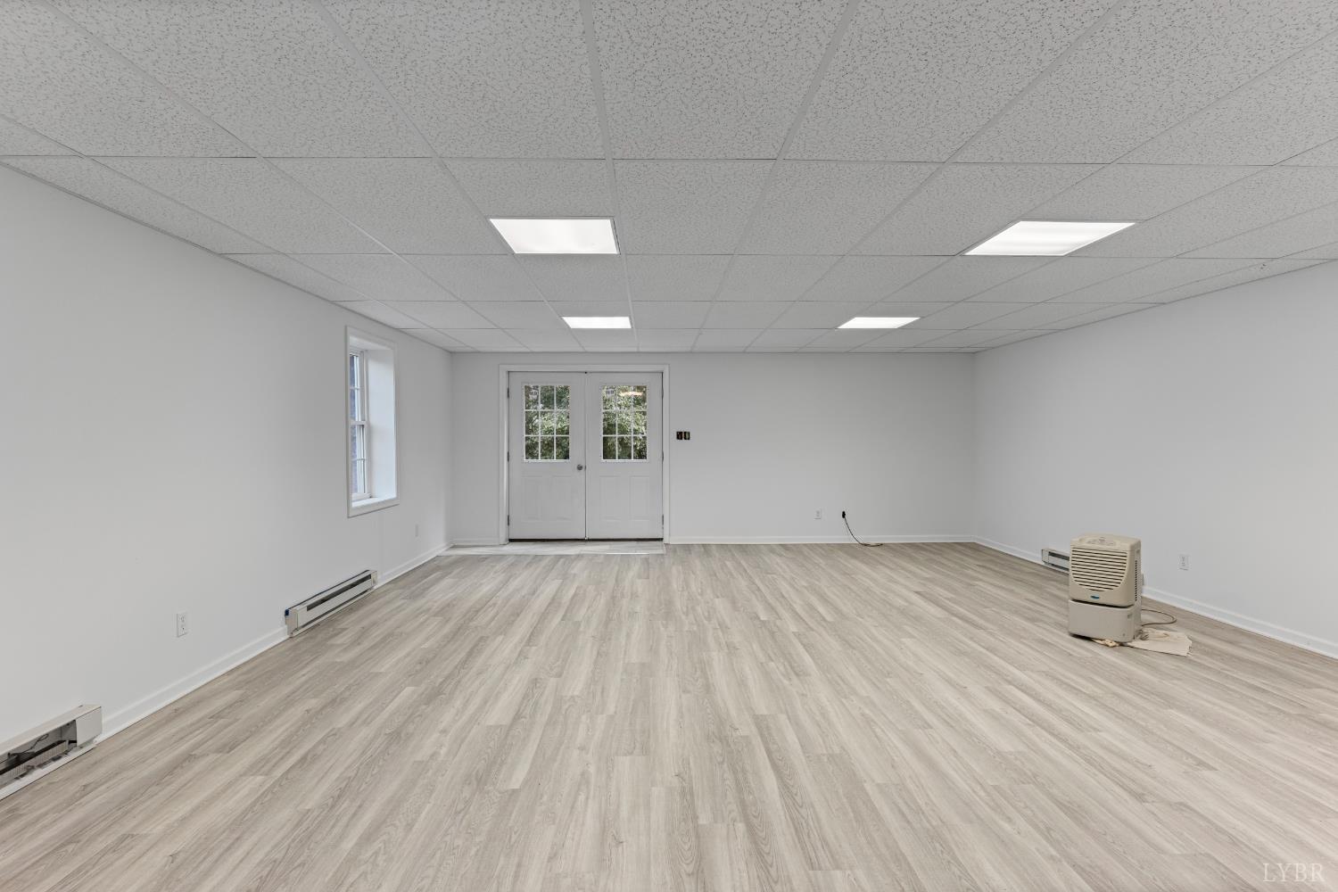233 View Lane Concord, VA 24538 - Photo 25 of 45 an empty room with wooden floor and windows