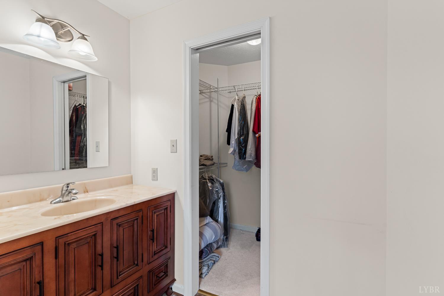 233 View Lane Concord, VA 24538 - Photo 8 of 45 a bathroom with a double vanity sink and a mirror