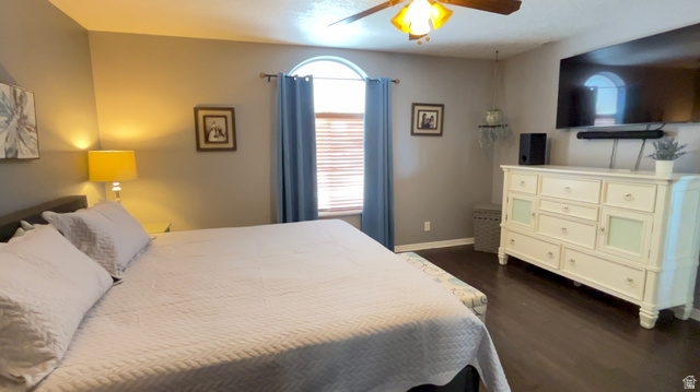 1797 Sunset Road Enoch, UT 84721 - Photo 22 of 80 Bedroom featuring wood-finish flooring, a ceiling fan with integrated lighting, and neutral wall tones