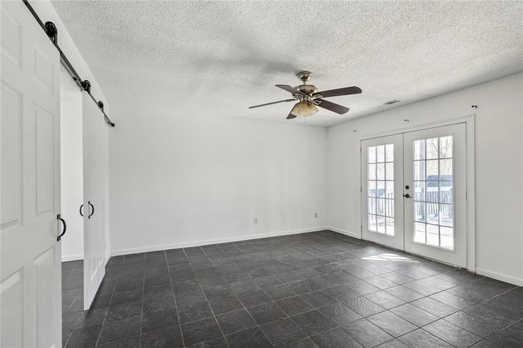 6132 Christopher Terrace Rex, GA 30273 - Photo 25 of 40 a view of an empty room with a window
