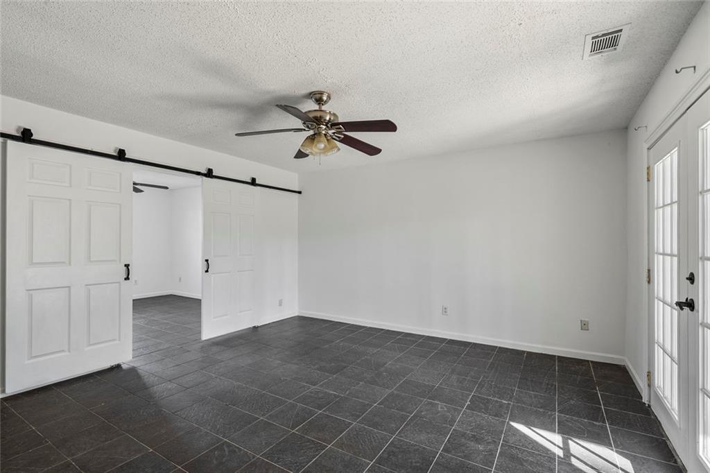 6132 Christopher Terrace Rex, GA 30273 - Photo 27 of 40 a view of a room with rack on the wall