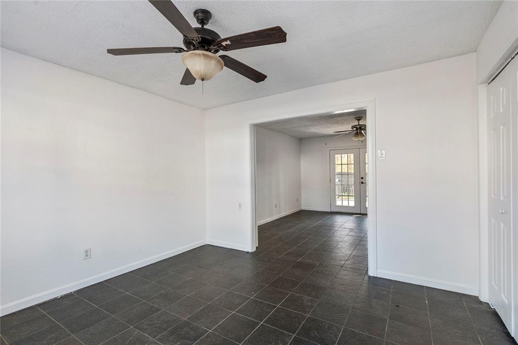 6132 Christopher Terrace Rex, GA 30273 - Photo 31 of 40 wooden floor in an empty room