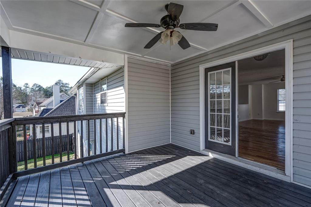 6132 Christopher Terrace Rex, GA 30273 - Photo 34 of 40 a view of a balcony with a ceiling fan