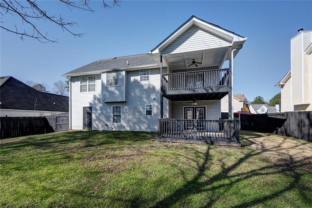 6132 Christopher Terrace Rex, GA 30273 - Photo 38 of 40 a view of house with yard and dinning table