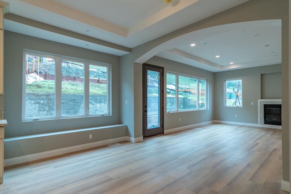 6565 Eagle Ridge Court Gilroy, CA 95020 - Photo 20 of 57 a view of an empty room with wooden floor and a window