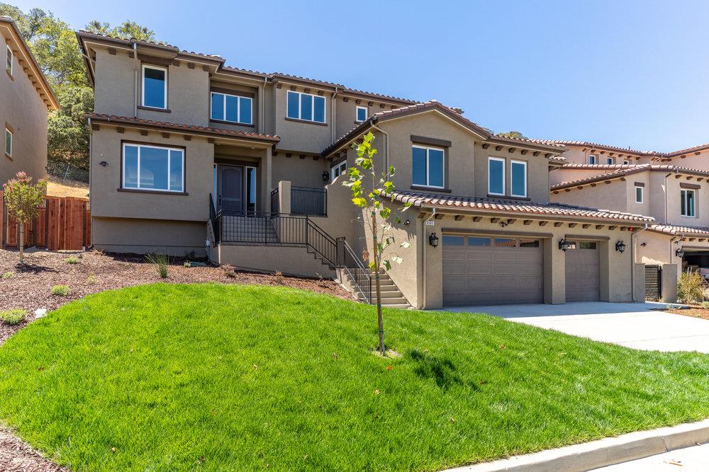 6565 Eagle Ridge Court Gilroy, CA 95020 - Photo 2 of 57 a view of an house with backyard and a garden