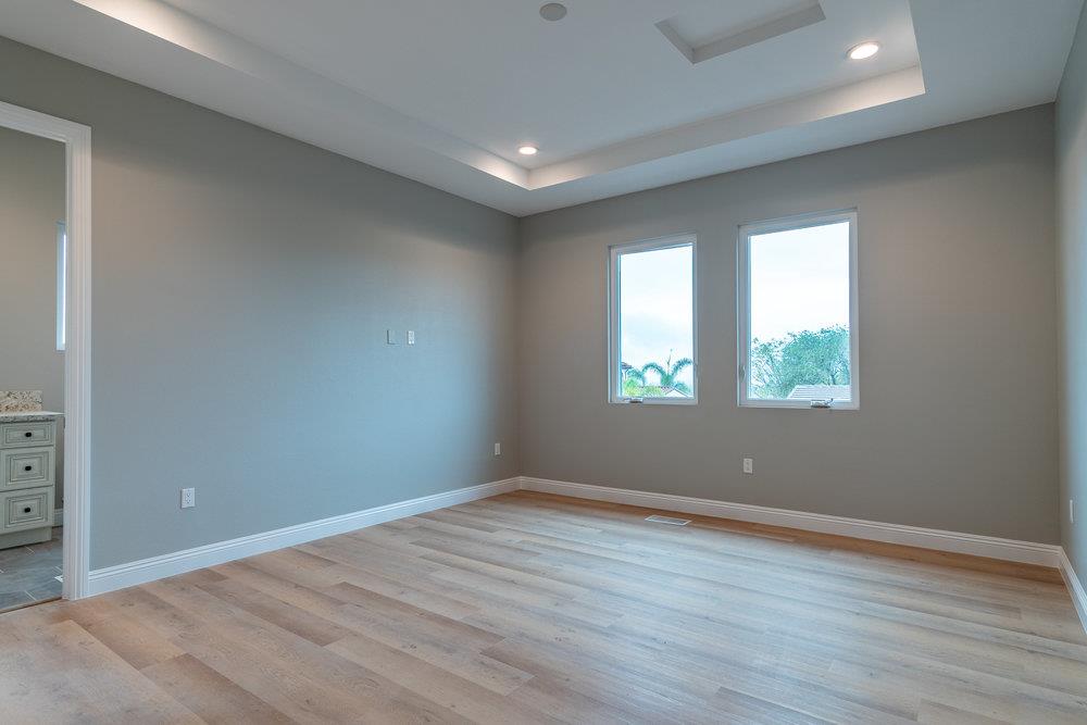 6565 Eagle Ridge Court Gilroy, CA 95020 - Photo 30 of 57 an empty room with wooden floor and windows