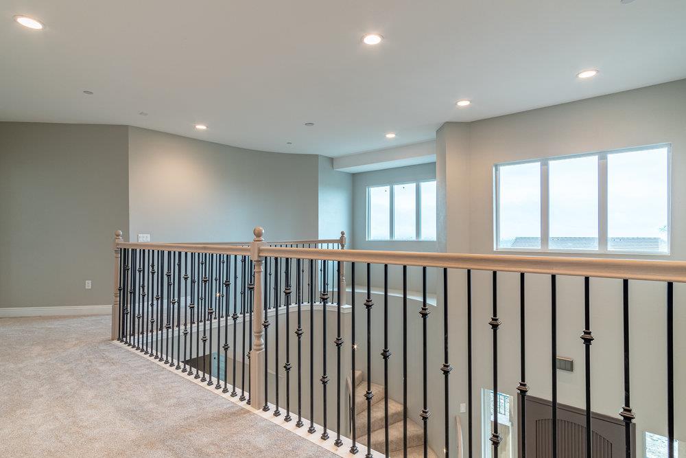 6565 Eagle Ridge Court Gilroy, CA 95020 - Photo 39 of 57 a view of a hallway with windows