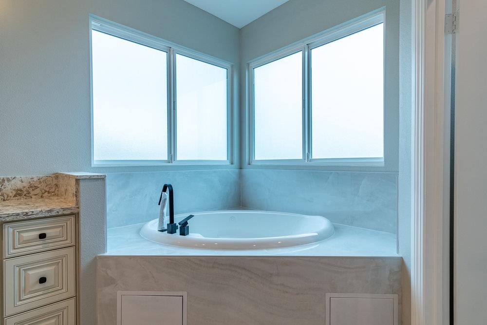 6565 Eagle Ridge Court Gilroy, CA 95020 - Photo 46 of 57 a bathroom with a sink and a window