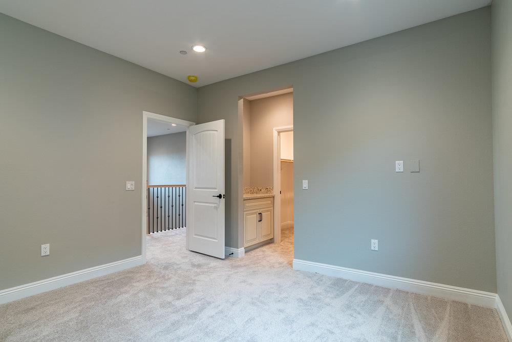 6565 Eagle Ridge Court Gilroy, CA 95020 - Photo 50 of 57 an empty room with closet and wooden door