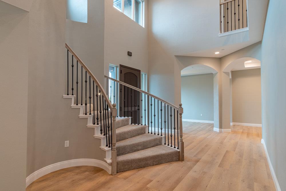 6565 Eagle Ridge Court Gilroy, CA 95020 - Photo 6 of 57 a view of staircase with railing and a rug