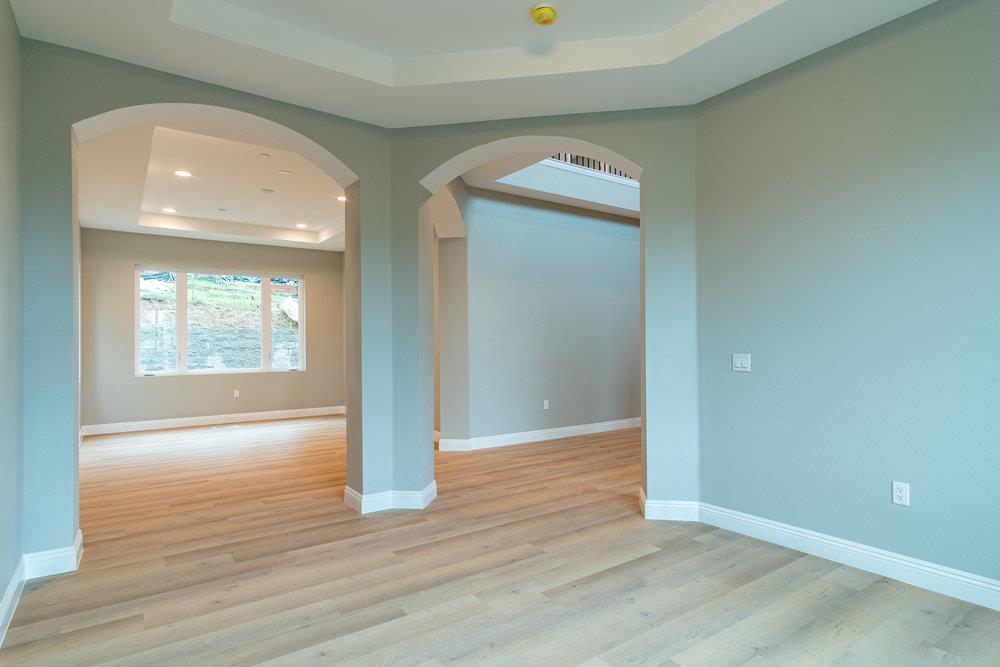 6565 Eagle Ridge Court Gilroy, CA 95020 - Photo 8 of 57 an empty room with wooden floor and windows