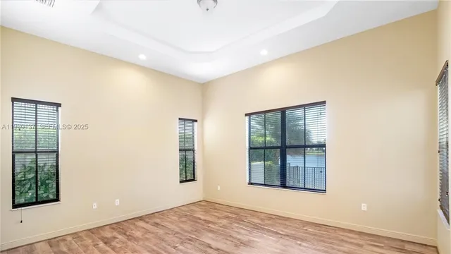 an empty room with windows