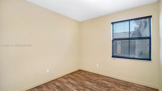 a view of a room that has a window in it