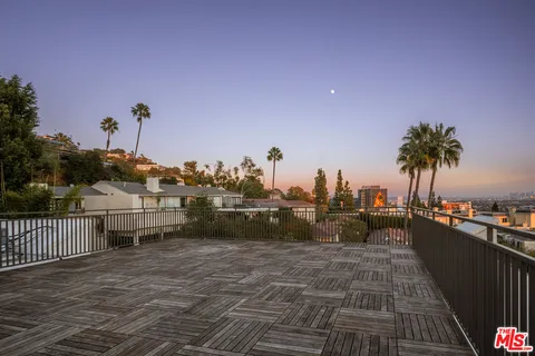 a view of a terrace with sitting area