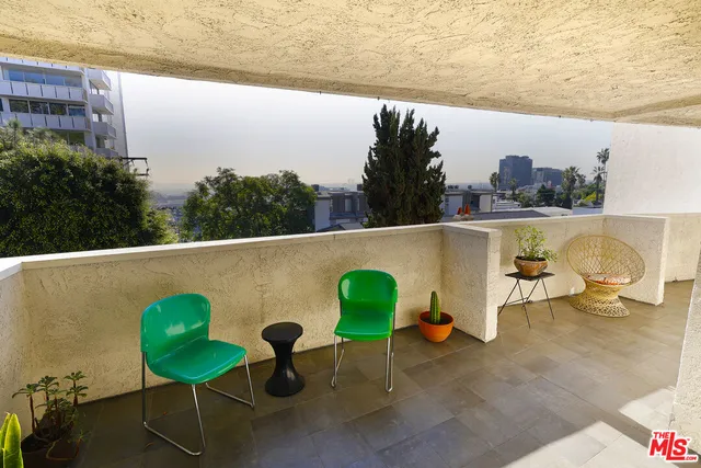 a view of a chairs in a patio