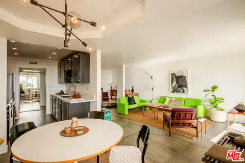 a view of a dining room with furniture