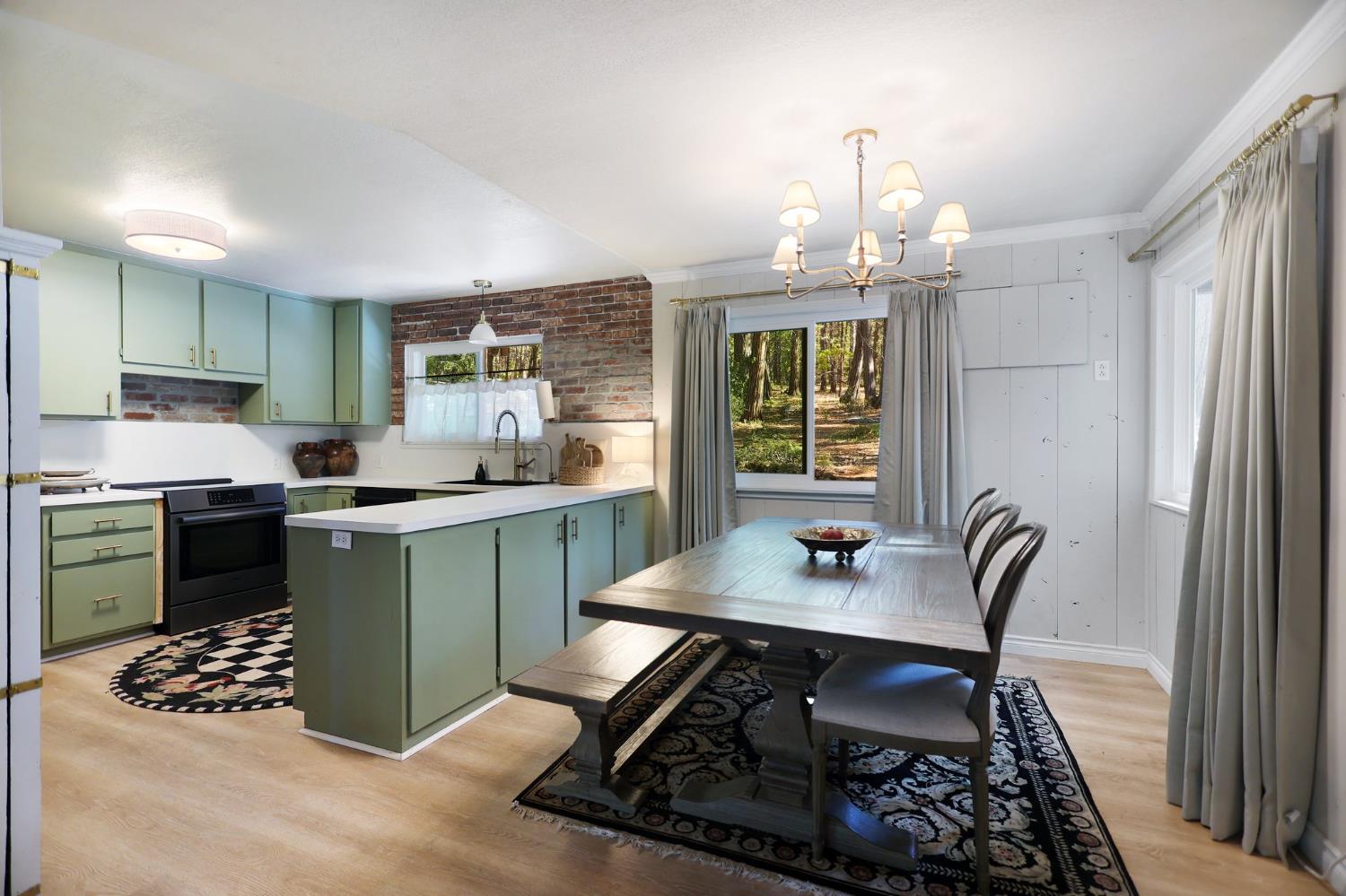 21800 Cedar Ridge Road Manton, CA 96059 - Photo 5 of 35 a kitchen with a table chairs and a window