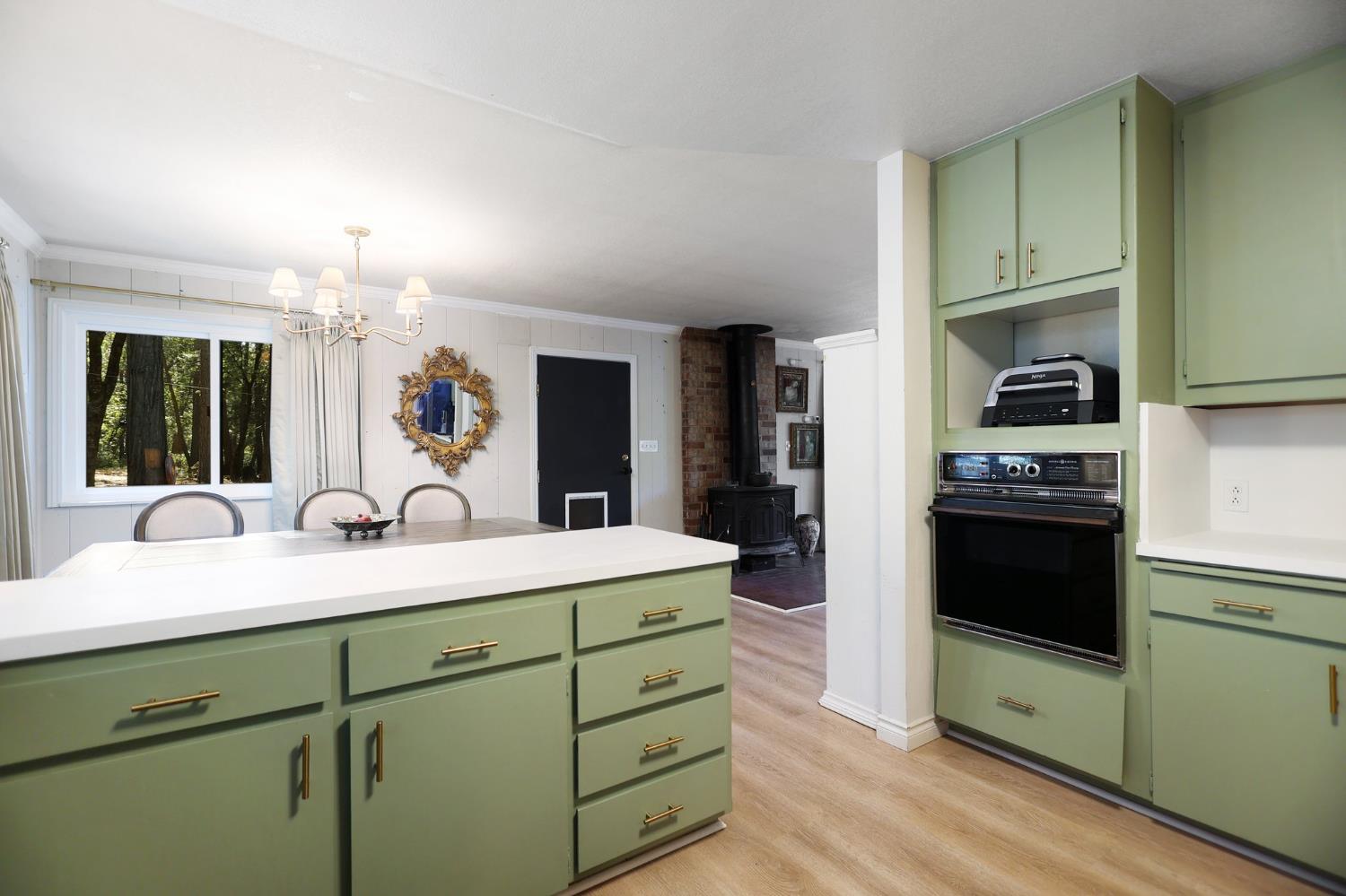 21800 Cedar Ridge Road Manton, CA 96059 - Photo 7 of 35 a kitchen with a sink and cabinets