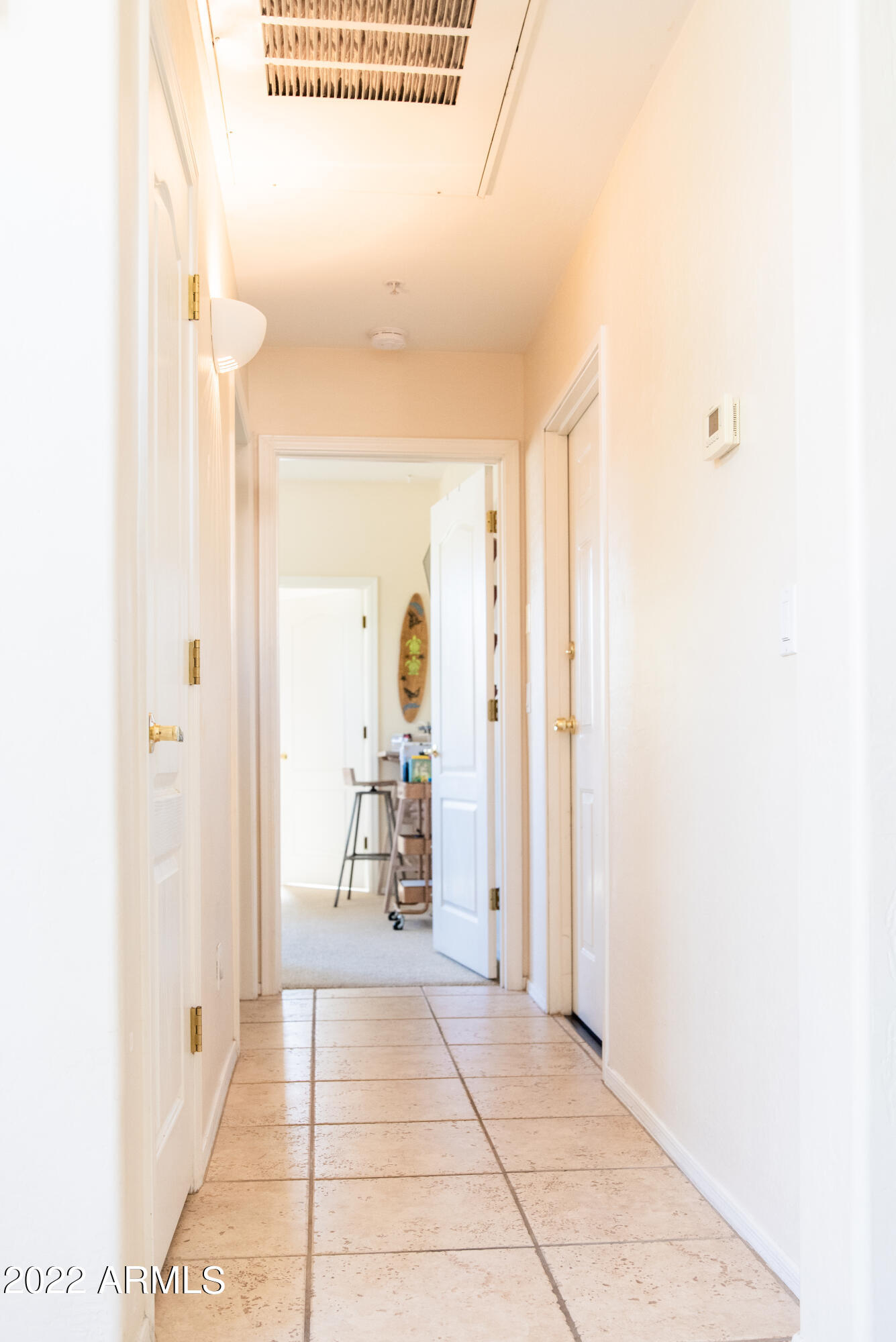 9065 East Gary Road, Unit 105 Scottsdale, AZ 85260 - Photo 12 of 32 Hall into Garage, Bath & 2nd Bedroom