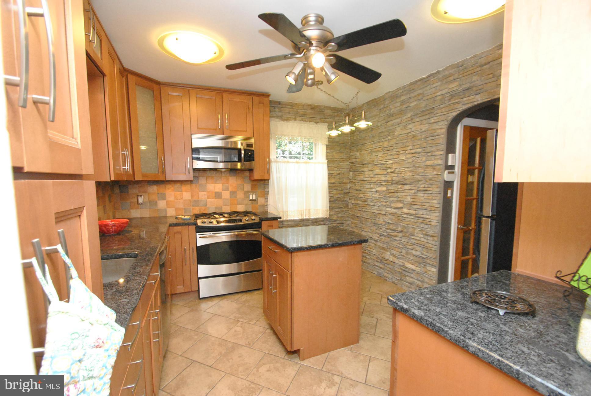 3006 Dunglow Road Baltimore, MD 21222 - Photo 11 of 30 DESIGNER KITCHEN - GRANITE COUNTERS - STONE WALL