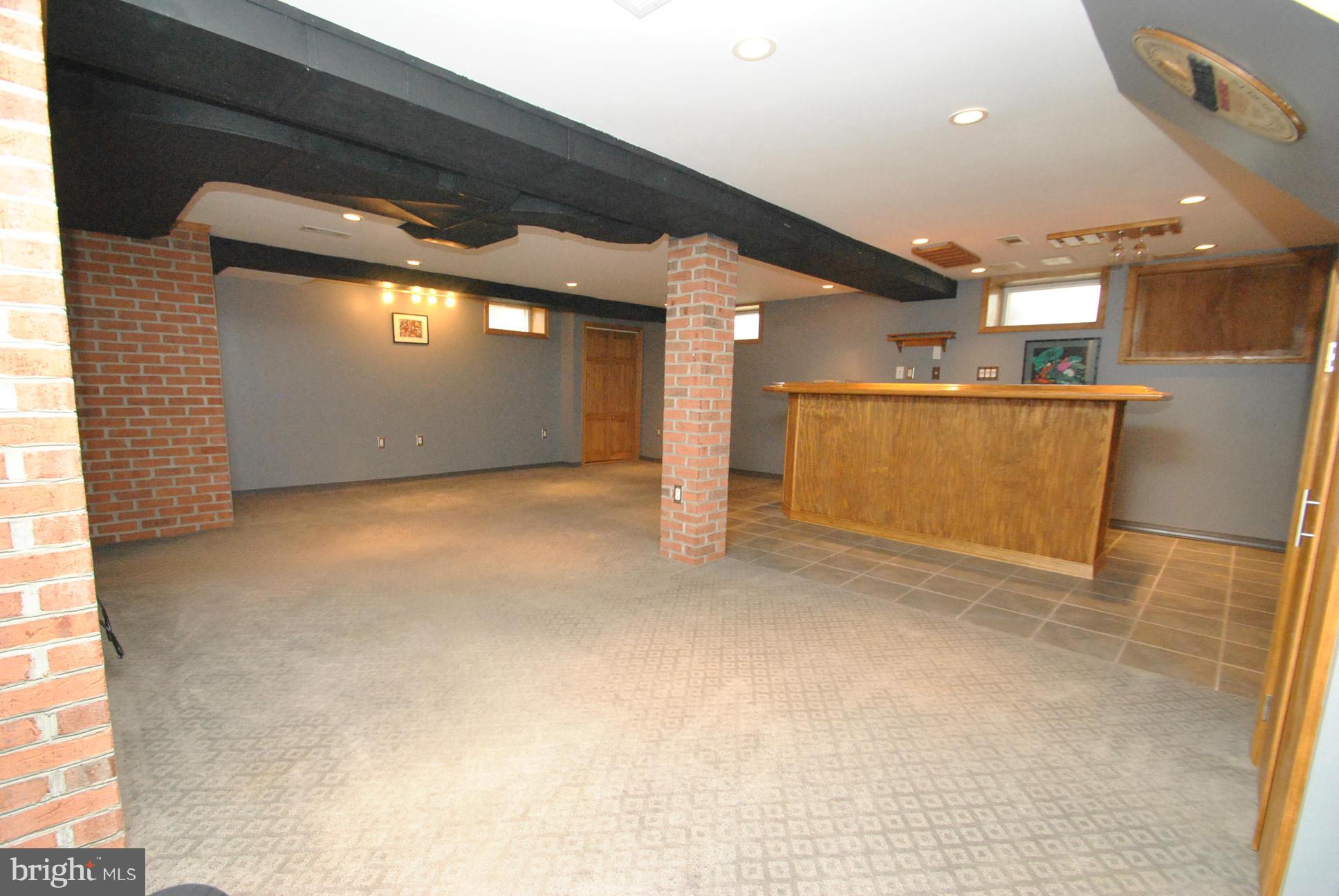 3006 Dunglow Road Baltimore, MD 21222 - Photo 19 of 30 FULLY FINISHED BASEMENT - REC ROOM - WET BAR