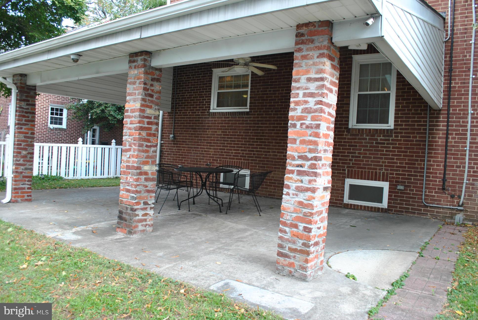 3006 Dunglow Road Baltimore, MD 21222 - Photo 29 of 30 COVERED REAR CONCRETE PATIO OUTDOOR LIVING AREA