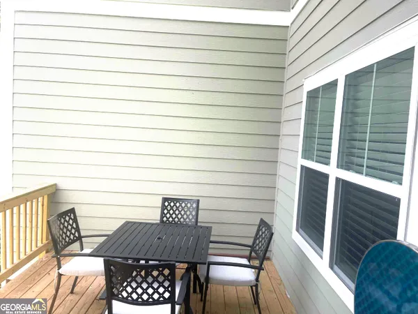 a view of a outdoor seating area with furniture