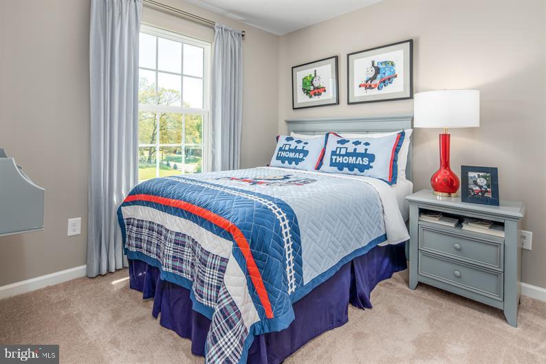 7848 Brandy Station Road, Unit MOZART Hanover, MD 21076 - Photo 15 of 27 a bedroom with bed and a window