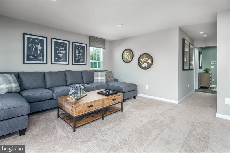 7848 Brandy Station Road, Unit MOZART Hanover, MD 21076 - Photo 18 of 27 a living room with furniture and a window