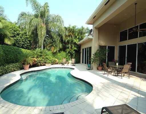 4134 Northwest 60th Street Boca Raton, FL 33496 - Photo 4 of 4 a view of a house with backyard porch and sitting area