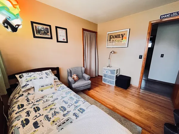 a bed room with a bed and a couch