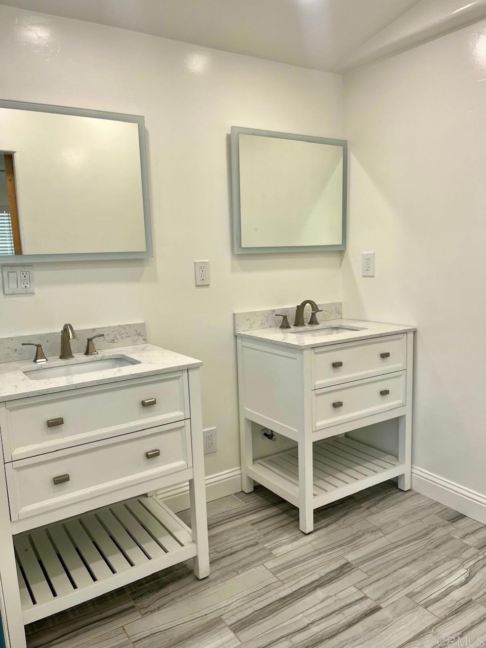 9902 Jamacha Boulevard, Unit 160 Spring Valley, CA 91977 - Photo 8 of 18 a bathroom with a sink and a mirror