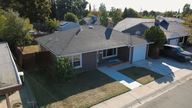 a view of house with outdoor space and seating space