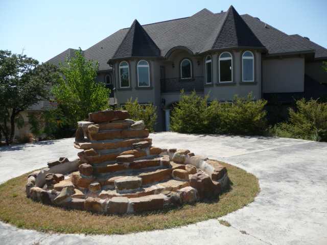 4412 City Park Road, Unit 1 Austin, TX 78730 - Photo 1 of 1 a view of a house with yard and plants