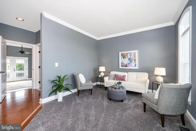 a bathroom with a sink toilet double vanity and shower