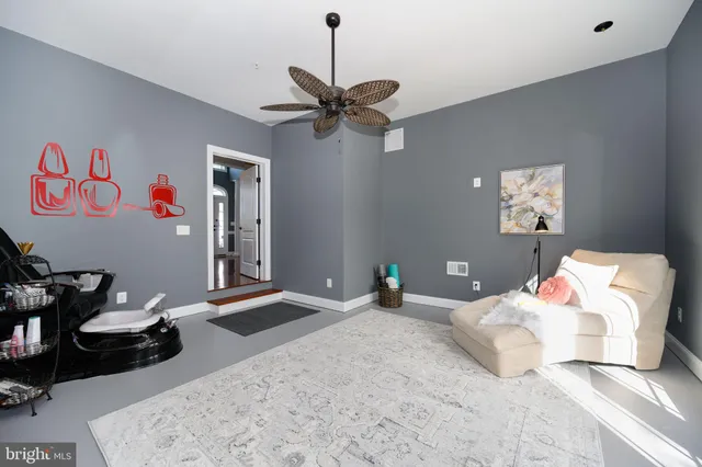 a view of a hallway with stairs