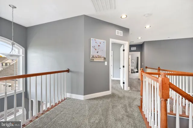 a view of a wrought iron fences in front of house