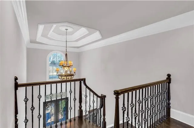 a view of a balcony with a chandelier