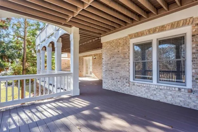 a view of a house with a roof deck