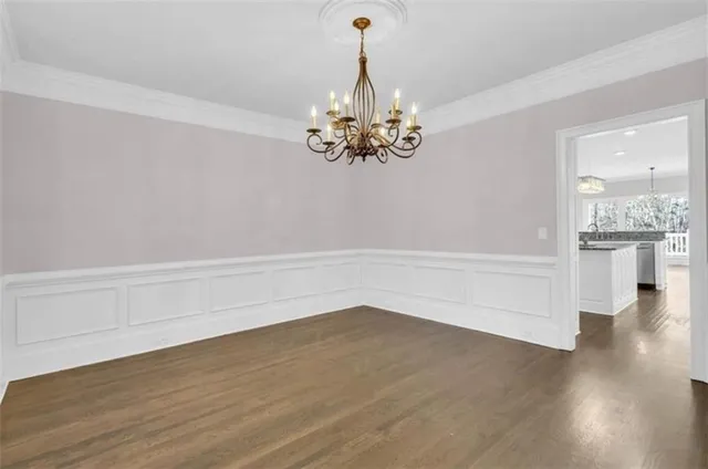 a view of a chandelier in an empty room