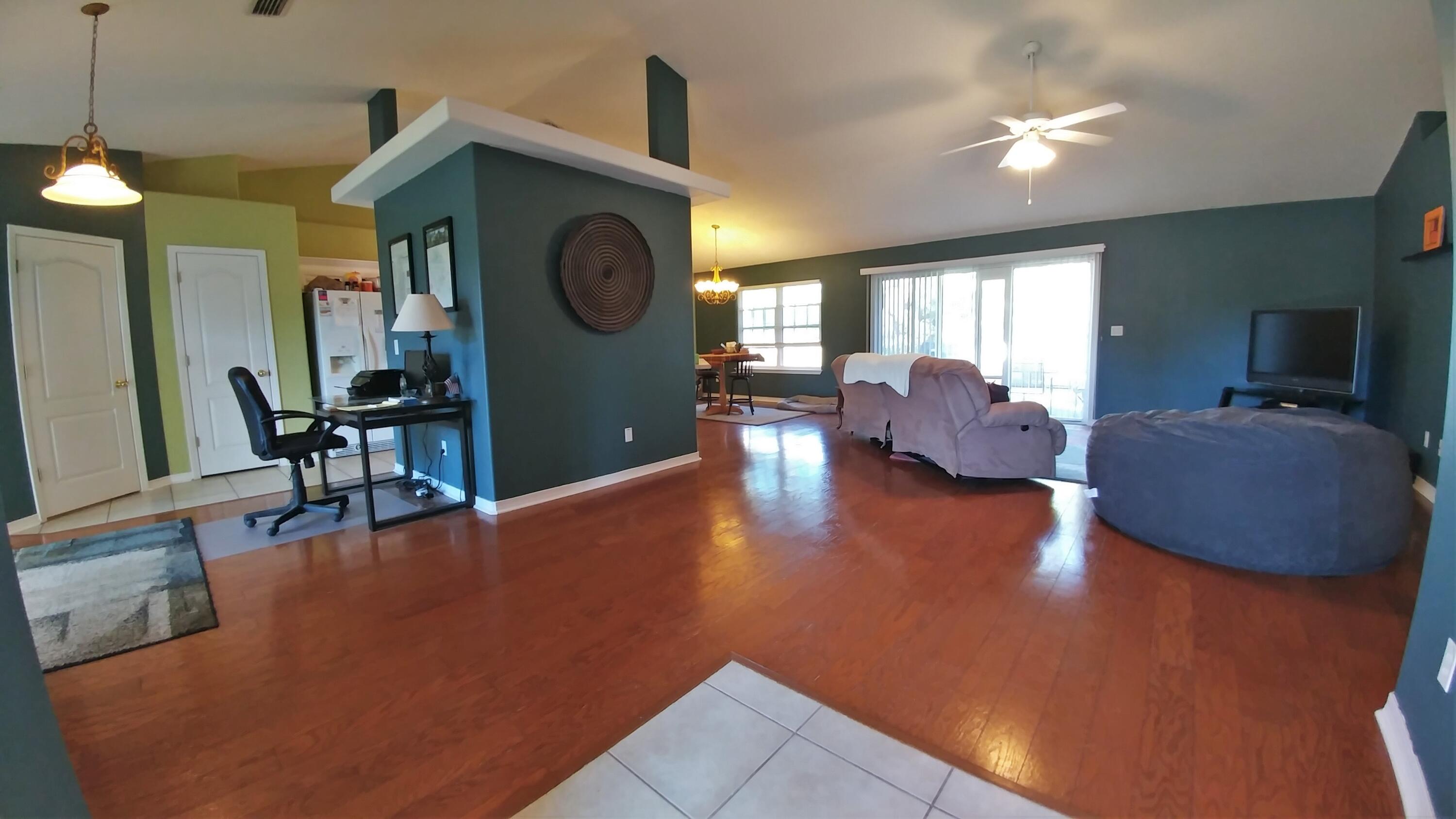 6568 Fern Street Navarre, FL 32566 - Photo 3 of 5 Living Room