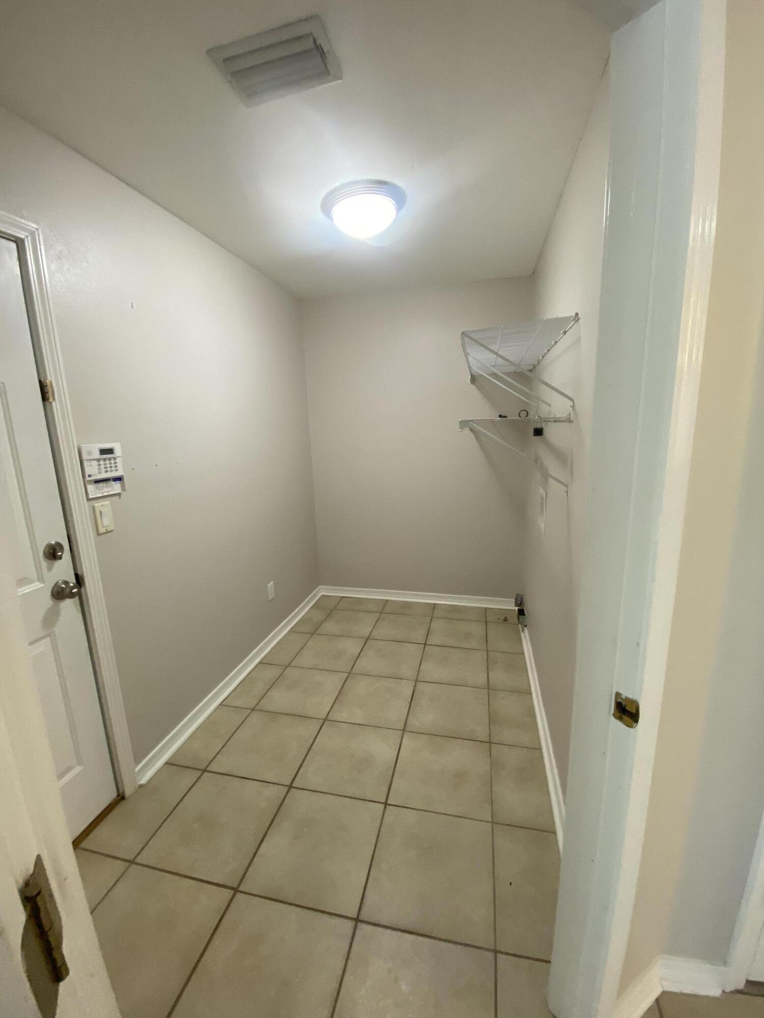 6568 Fern Street Navarre, FL 32566 - Photo 10 of 10 a view of utility room