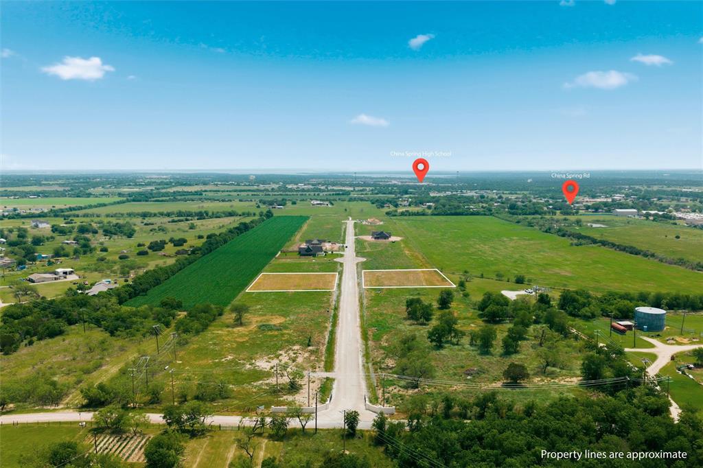 259 Lacek Mill Road China Spring, TX 76633 - Photo 3 of 10 a view of a golf course with a yard